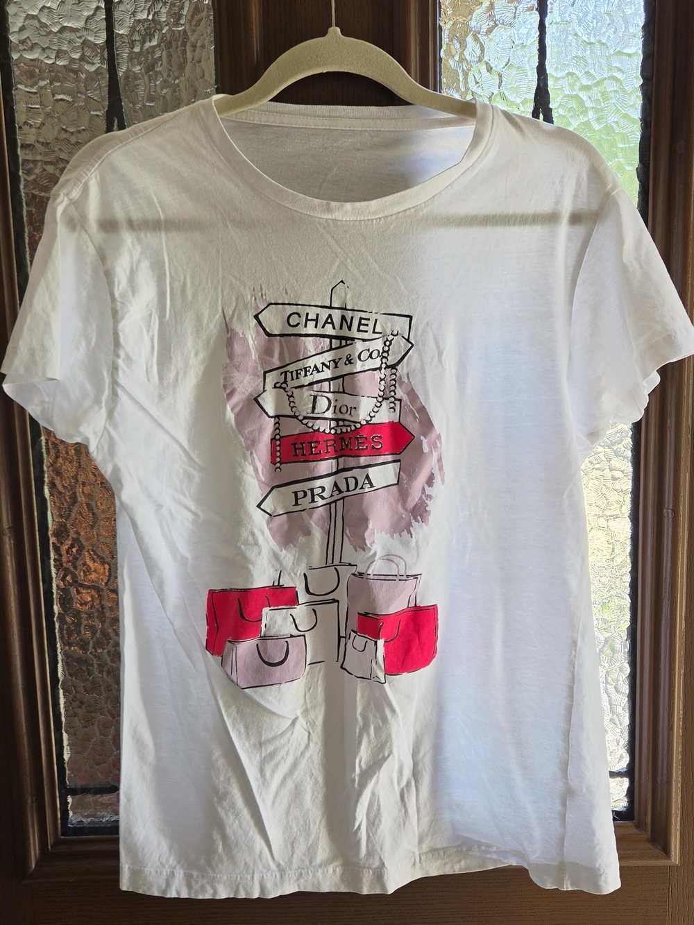 White Graphic Tee with Luxury Brand Signpost